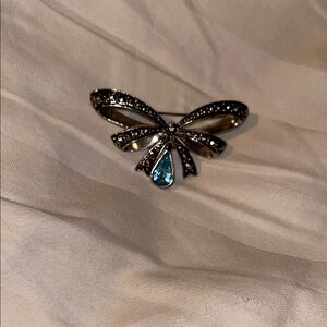Elegant Silver and Blue Bow Brooch